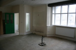 Part of the main shop room. Counter will be by the window.
